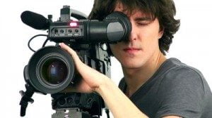 stock-footage-professional-cameraman-isolated-on-white-background-300x168