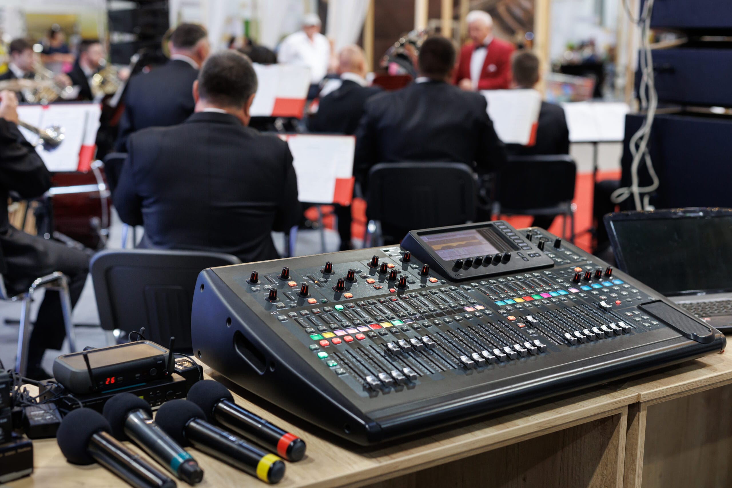 Professional concert mixing console and microphones at the conference. Professional concert mixing console and microphones at the conference.